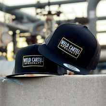 Load image into Gallery viewer, Black Gold Weld Cartel Trucker Hat
